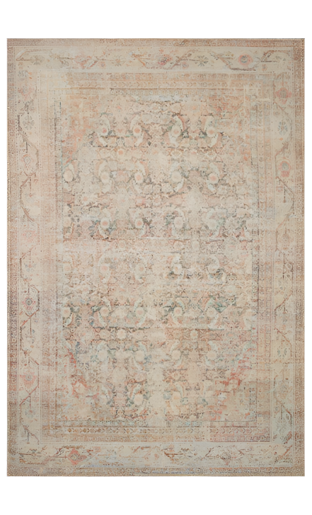 Decorative rug with intricate patterns in beige, brown, and pink tones.