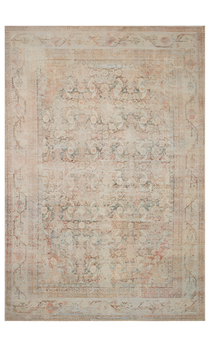 Decorative rug with intricate patterns in beige, brown, and pink tones.